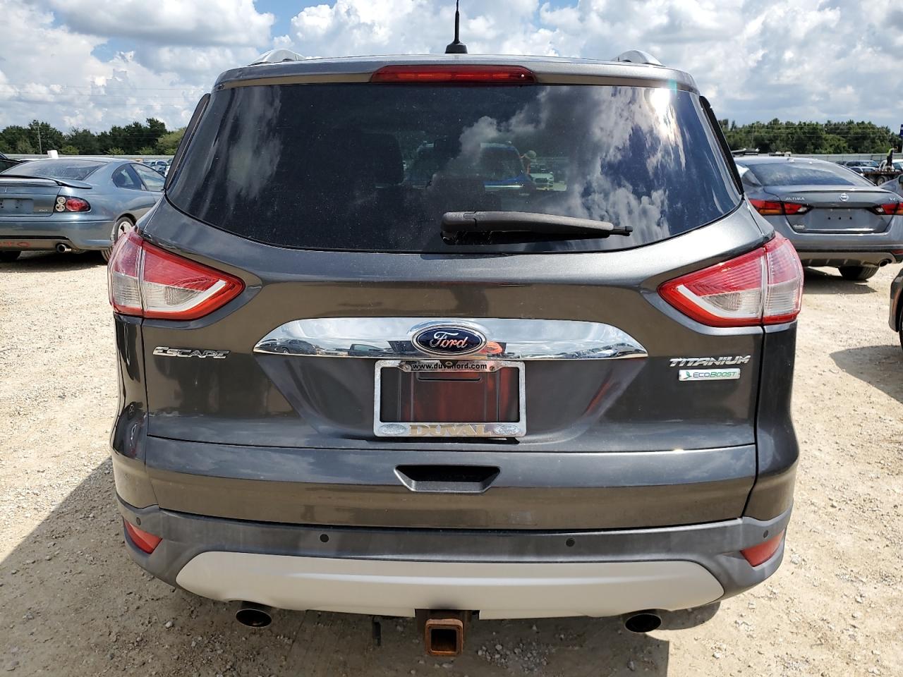 2015 Ford Escape VIN 1FMCU0J99FUB74872 Copart auction photo, water/flood damage thumbnail 6