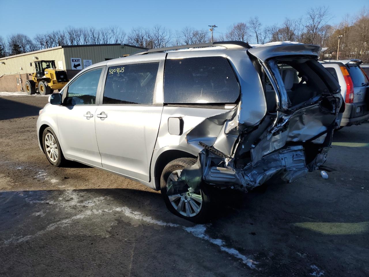 2015 Toyota Sienna VIN 5TDJK3DC3FS111829 Copart auction photo, rear end / minor dent/scratches damage thumbnail 2
