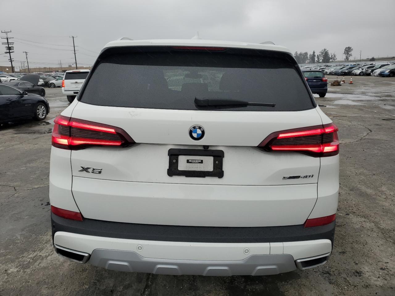 2022 BMW X5 VIN 5UXCR4C00N9J82399 Copart auction photo, front end / side damage thumbnail 6