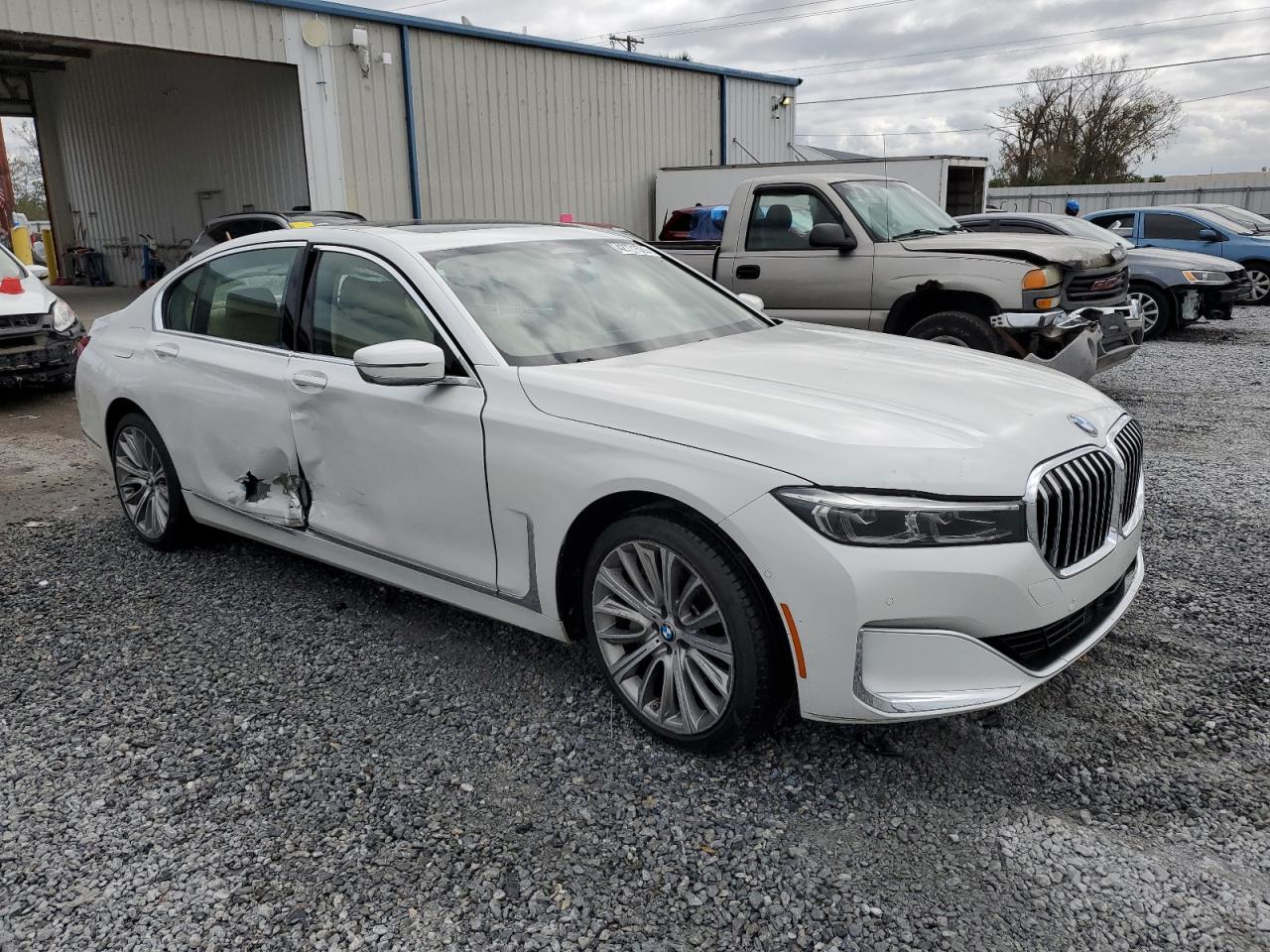 2020 BMW 7er VIN WBA7U2C05LGJ59504 Copart auction photo, side damage thumbnail 4
