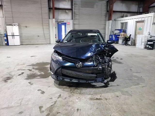2017 Toyota Corolla VIN 2T1BURHE5HC827561 Copart auction photo, front end damage thumbnail 10