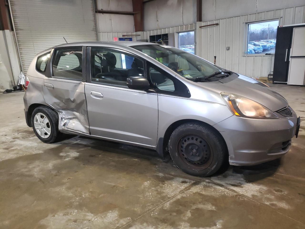 2010 Honda Fit VIN JHMGE8H23AS012880 Copart auction photo, side damage thumbnail 4