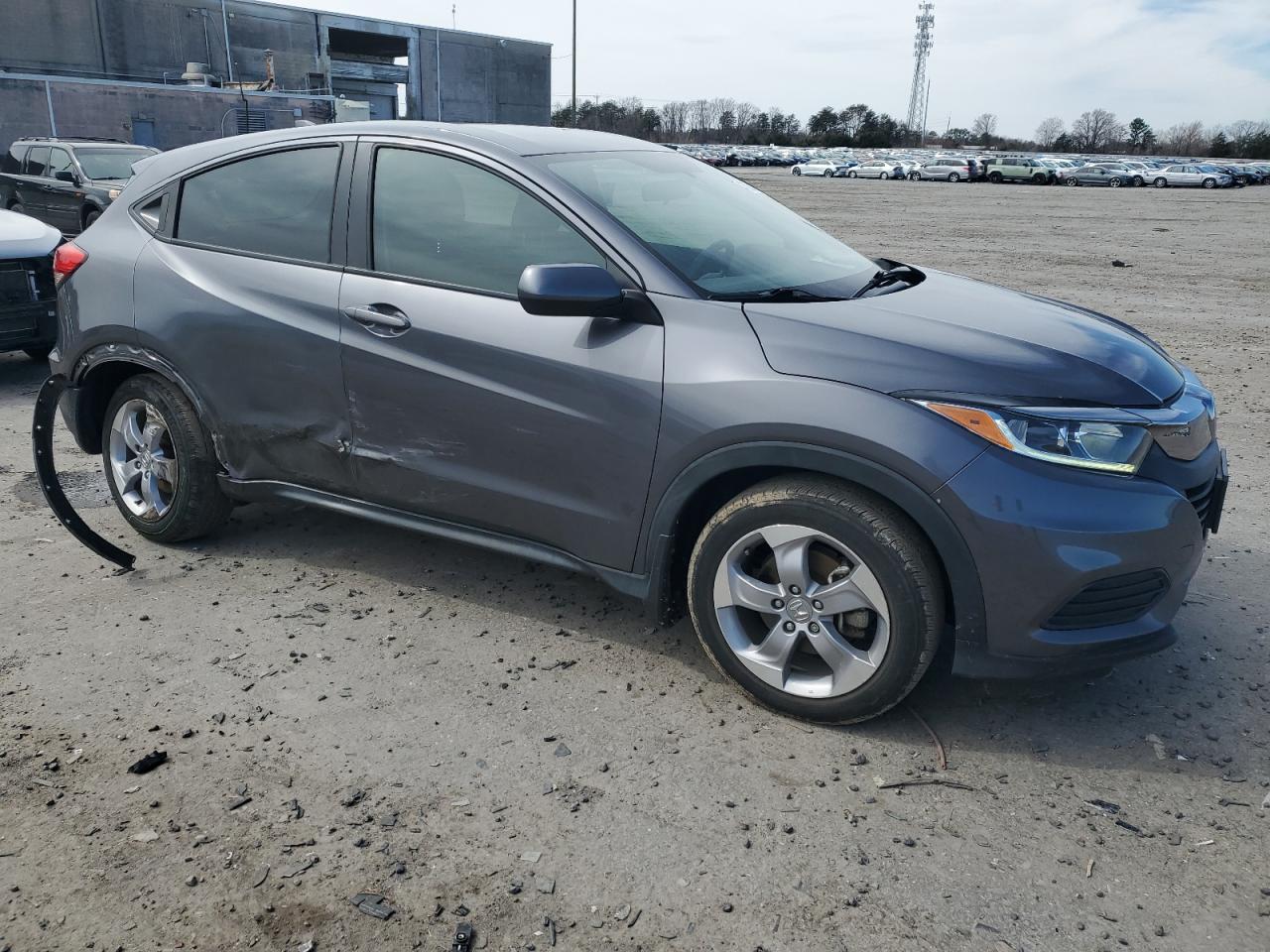 2020 Honda HR-V VIN 3CZRU6H34LM729188 Copart auction photo, undercarriage / side damage thumbnail 4