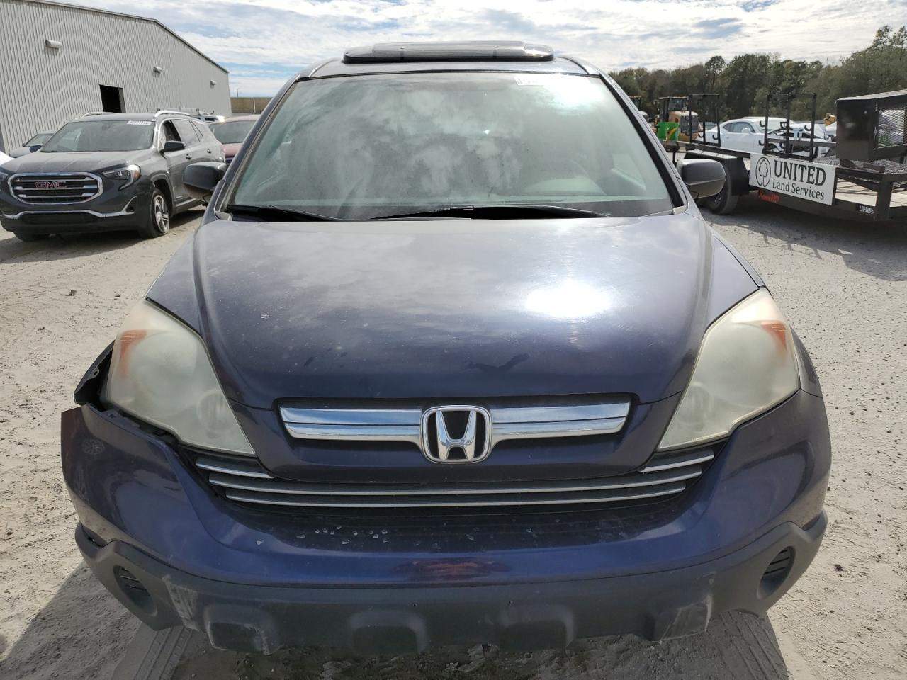 2009 Honda CR-V VIN 5J6RE38539L018203 Copart auction photo, side / front end damage thumbnail 5