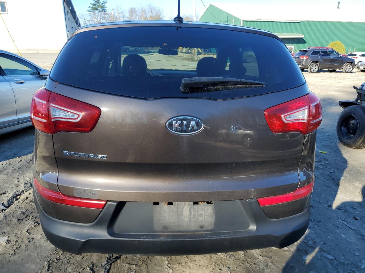 2011 KIA Sportage VIN KNDPBCA28B7073444 Copart auction photo, side / minor dent/scratches damage thumbnail 6
