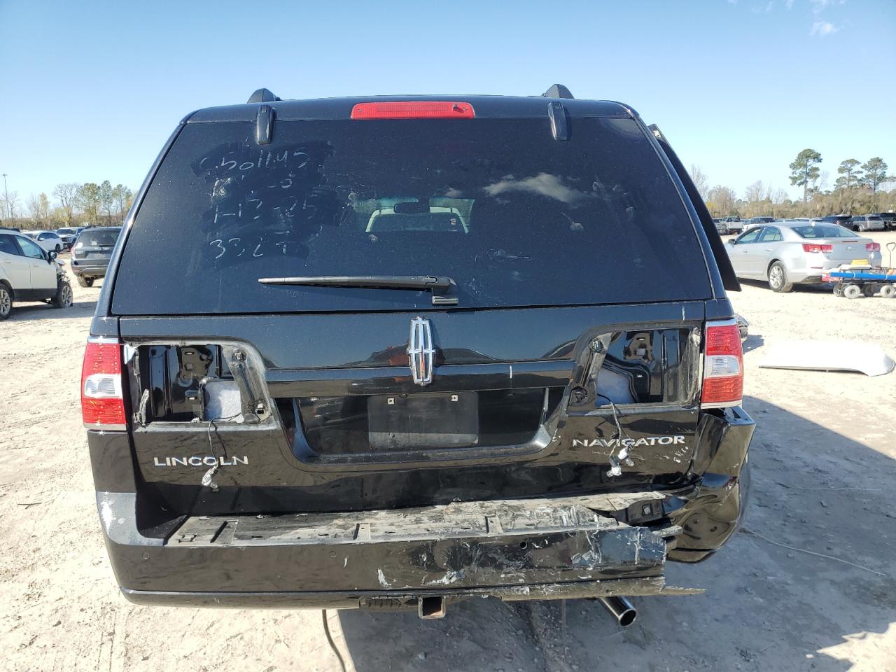 2014 Lincoln Navigator VIN 5LMJJ2H50EEL03327 Copart auction photo, rear end / side damage thumbnail 6