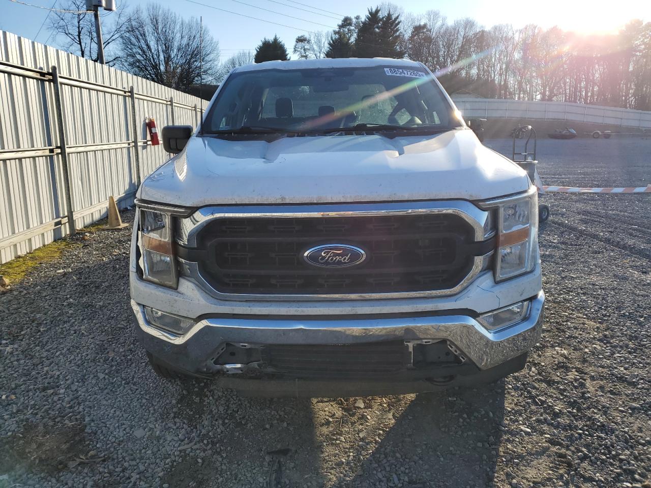 2022 Ford F-150 VIN 1FTFW1E54NKE66710 Copart auction photo, front end / side damage thumbnail 5