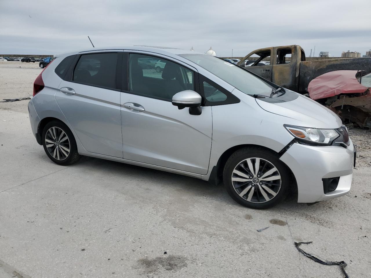 2015 Honda Fit VIN 3HGGK5G87FM723370 Copart auction photo, all over damage thumbnail 4