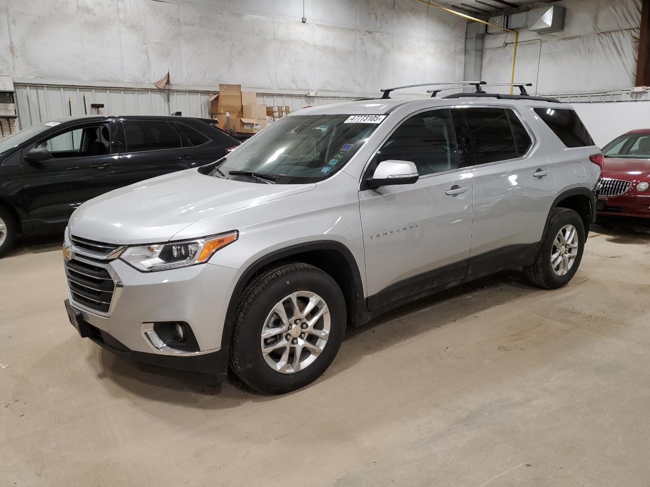2021 Chevrolet Traverse VIN 1GNEVHKW7MJ265576 - Copart auction photo