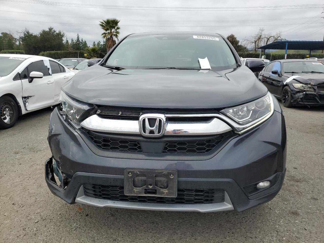 2019 Honda CR-V VIN 5J6RW1H56KA015640 Copart auction photo, front end / side damage thumbnail 5