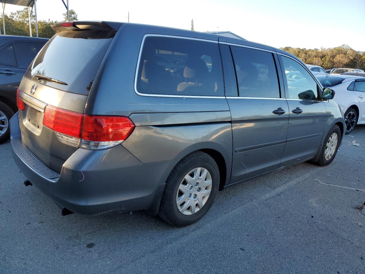 2010 Honda Odyssey VIN 5FNRL3H20AB109759 Copart auction photo, side damage thumbnail 3