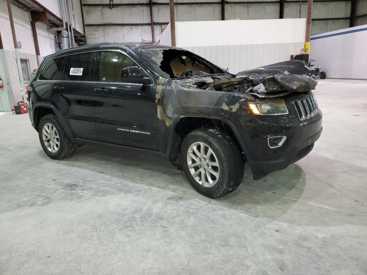 2015 Jeep Grand Cherokee VIN 1C4RJFAG7FC764714 Copart auction photo, burn damage thumbnail 4