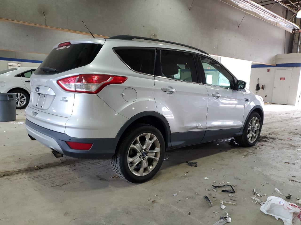 2016 Ford Escape VIN 1FMCU9G97GUB21469 Copart auction photo, side / minor dent/scratches damage thumbnail 3