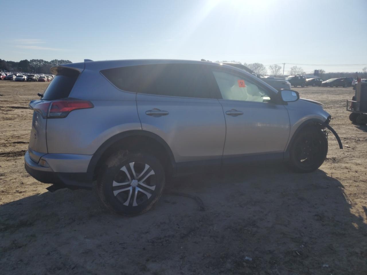2017 Toyota RAV 4 VIN 2T3BFREV9HW633040 Copart auction photo, front end / side damage thumbnail 3