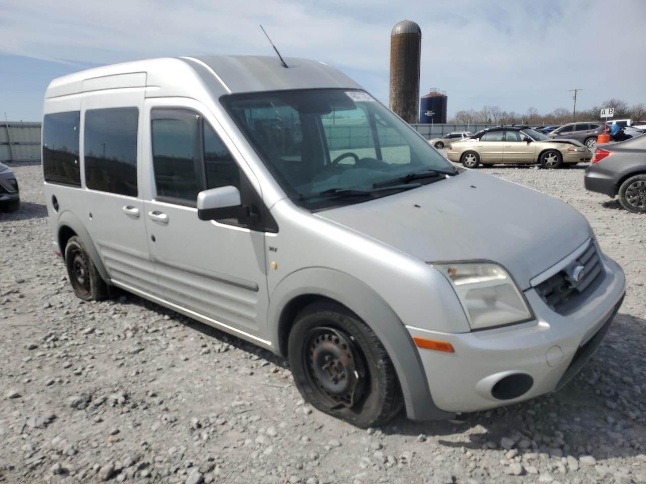 2011 Ford Transit VIN NM0KS9CN7BT047765 Copart auction photo, front end / minor dent/scratches damage thumbnail 4