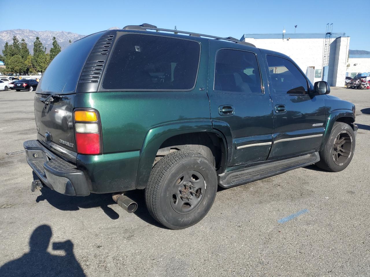 2003 Chevrolet Tahoe VIN 1GNEC13TX3R233366 Copart auction photo, side damage thumbnail 3