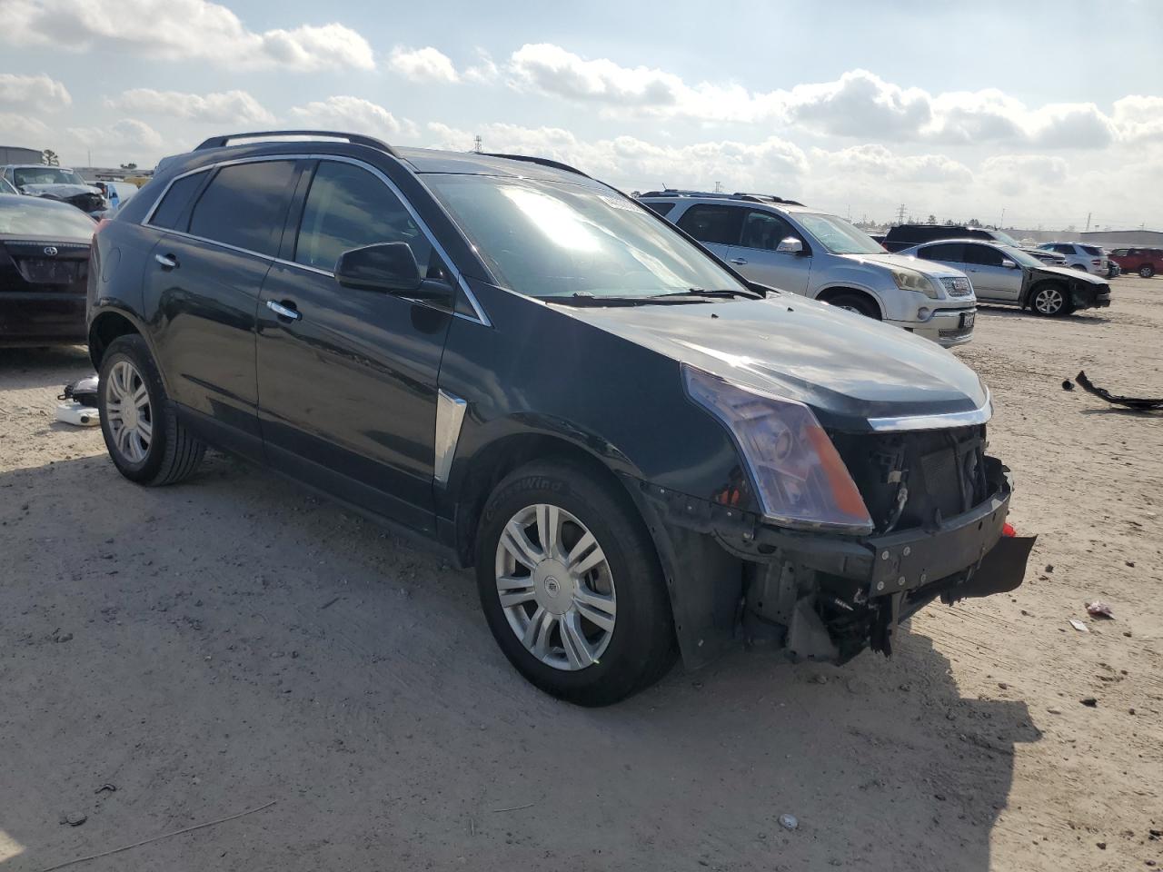 2016 Cadillac SRX VIN 3GYFNAE30GS556312 Copart auction photo, front end / minor dent/scratches damage thumbnail 4