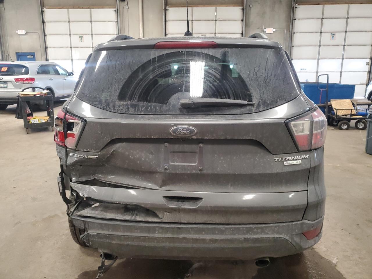 2017 Ford Escape VIN 1FMCU0J95HUC50803 Copart auction photo, rear end damage thumbnail 6