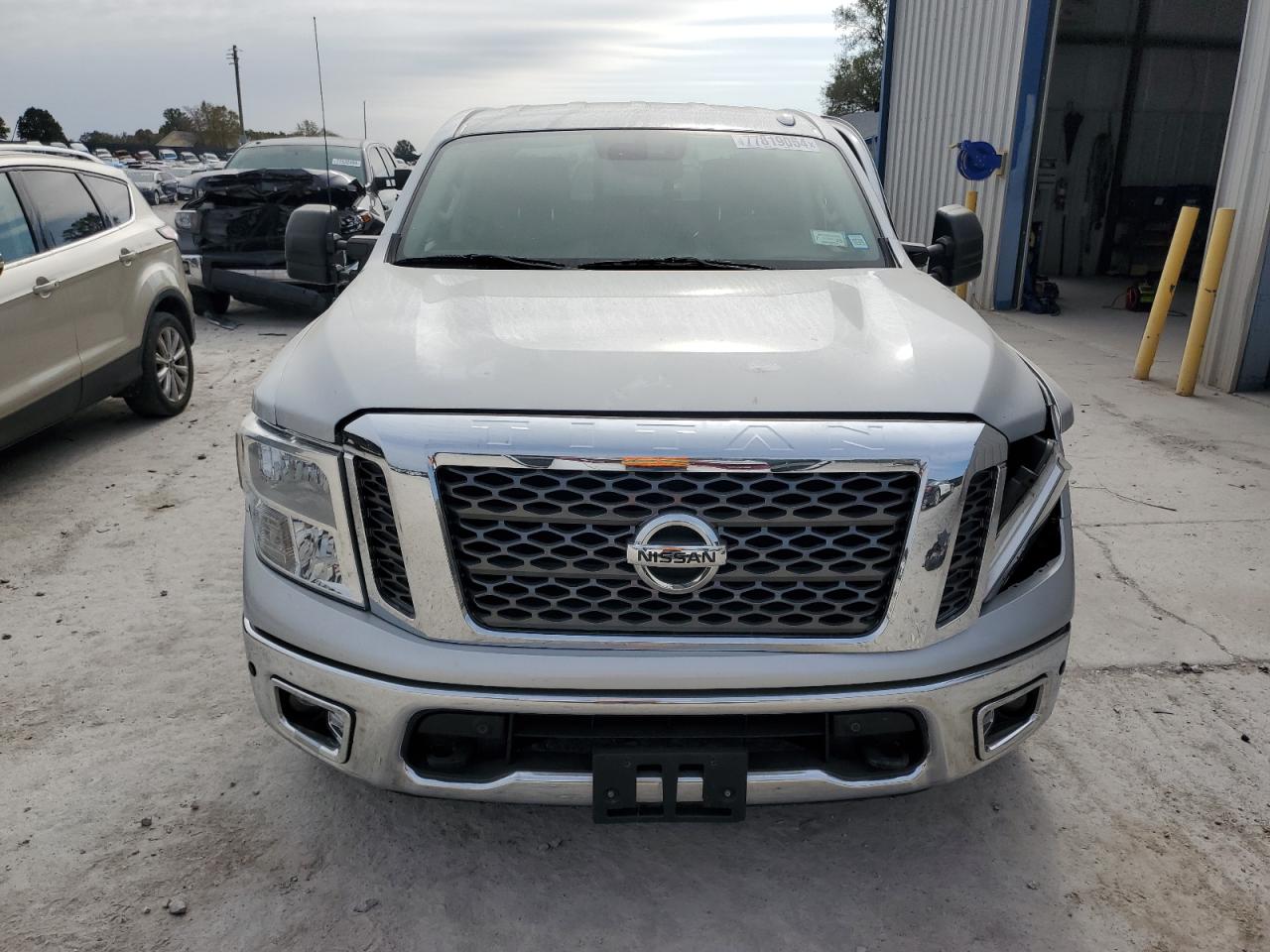 2017 Nissan Titan VIN 1N6AA1E57HN521367 Copart auction photo, side damage thumbnail 5