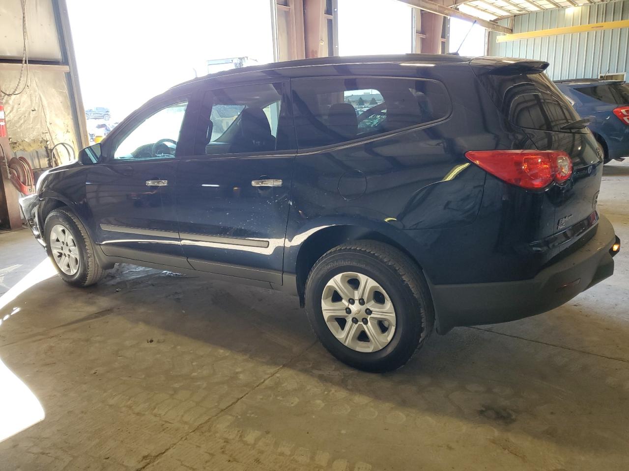 2012 Chevrolet Traverse VIN 1GNKVFED5CJ349802 Copart auction photo, front end / minor dent/scratches damage thumbnail 2