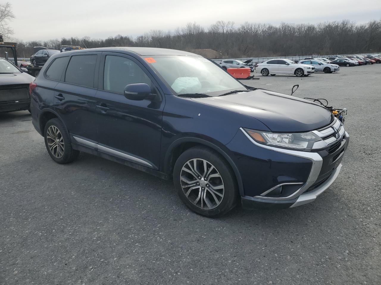 2016 Mitsubishi Outlander VIN JA4AZ3A33GZ048788 Copart auction photo, side / front end damage thumbnail 4