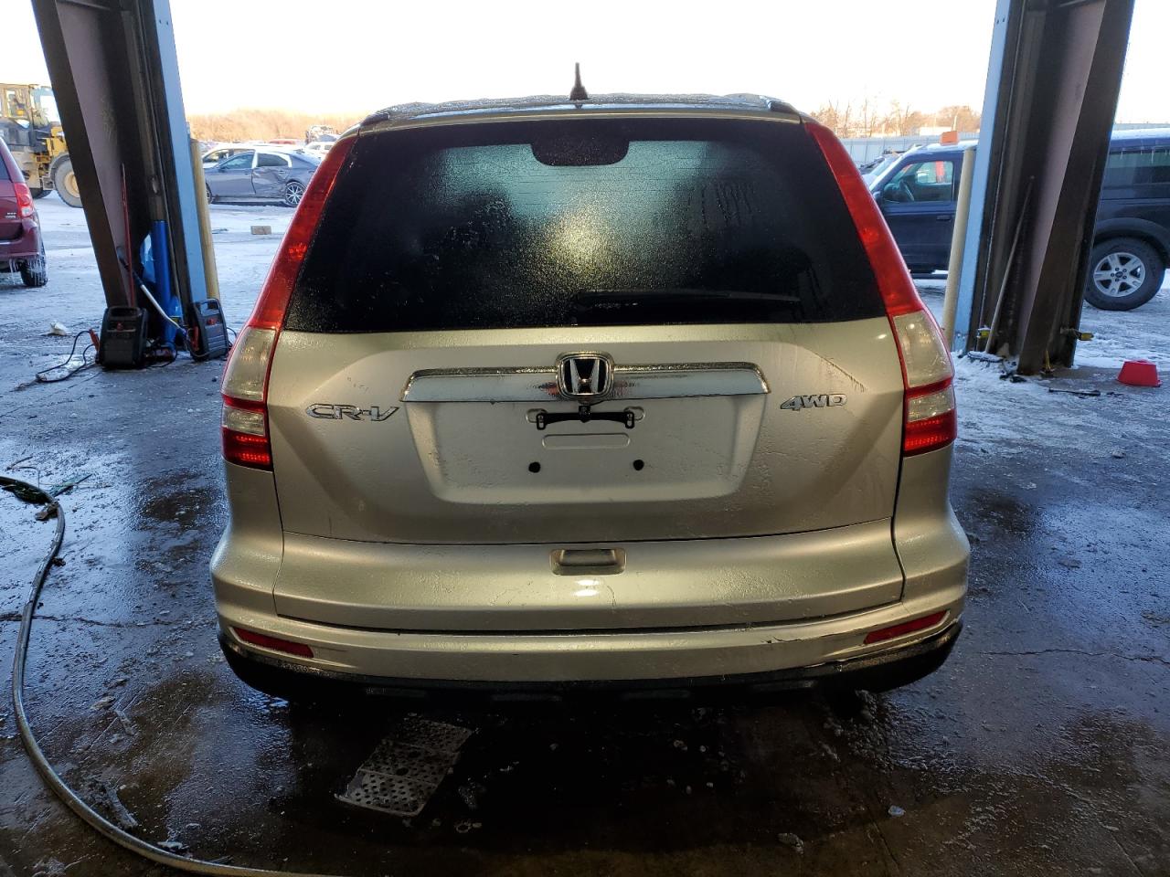 2010 Honda CR-V VIN 3CZRE4H52AG703851 Copart auction photo, side damage thumbnail 6