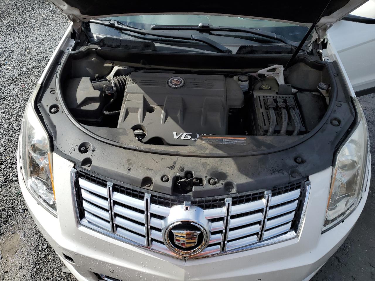 2015 Cadillac SRX VIN 3GYFNBE31FS564195 Copart auction photo, rear end / side damage thumbnail 12
