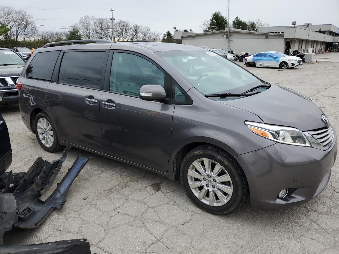 2015 Toyota Sienna VIN 5TDYK3DC0FS555281 Copart auction photo, side / rear end damage thumbnail 4