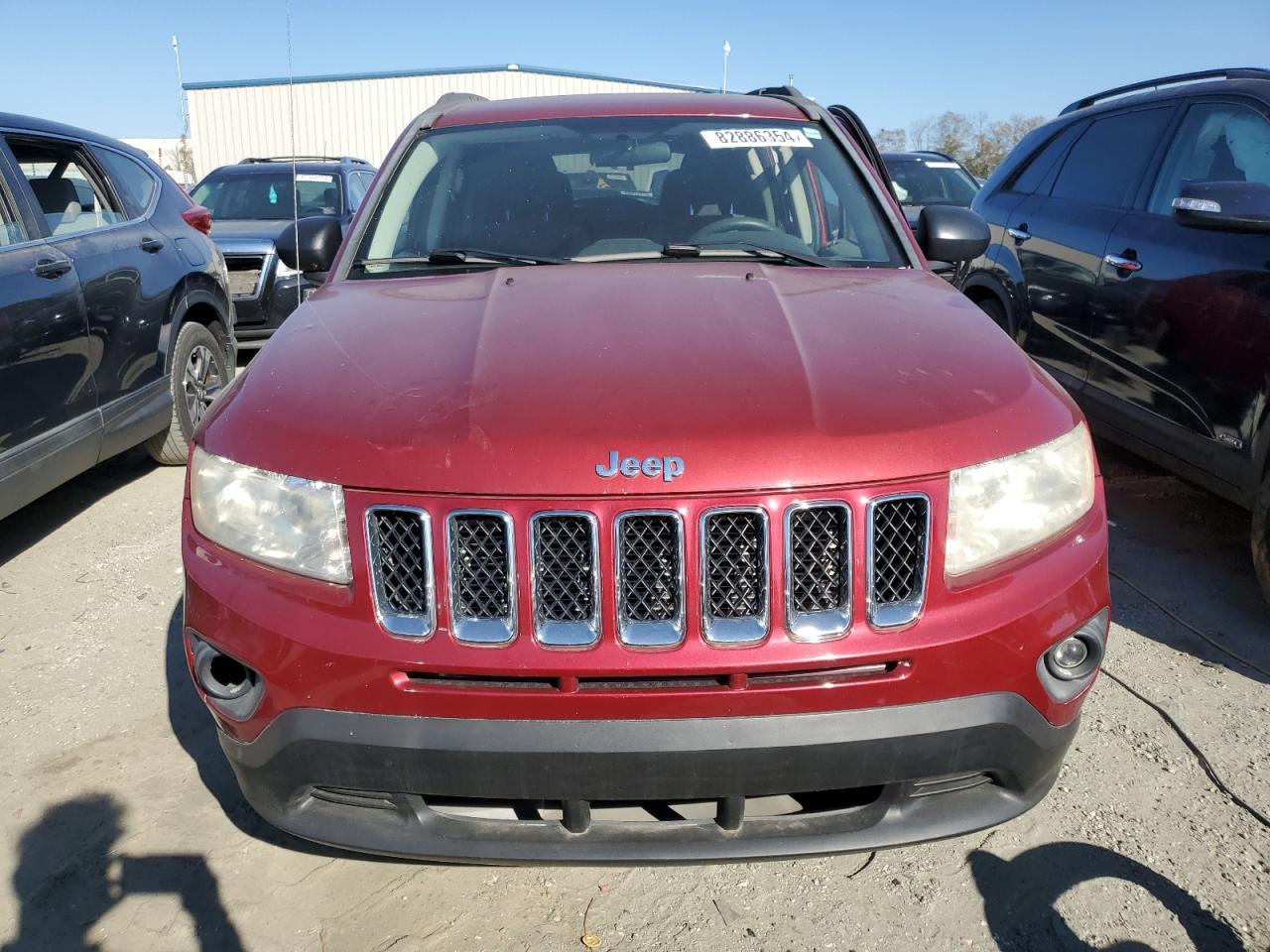 2012 Jeep Compass VIN 1C4NJCBB2CD631834 Copart auction photo, side damage thumbnail 5
