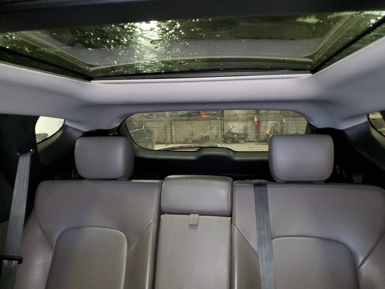 2013 Hyundai Santa Fe VIN 5XYZU3LB1DG031705 Copart auction photo, rear end / undercarriage damage thumbnail 10