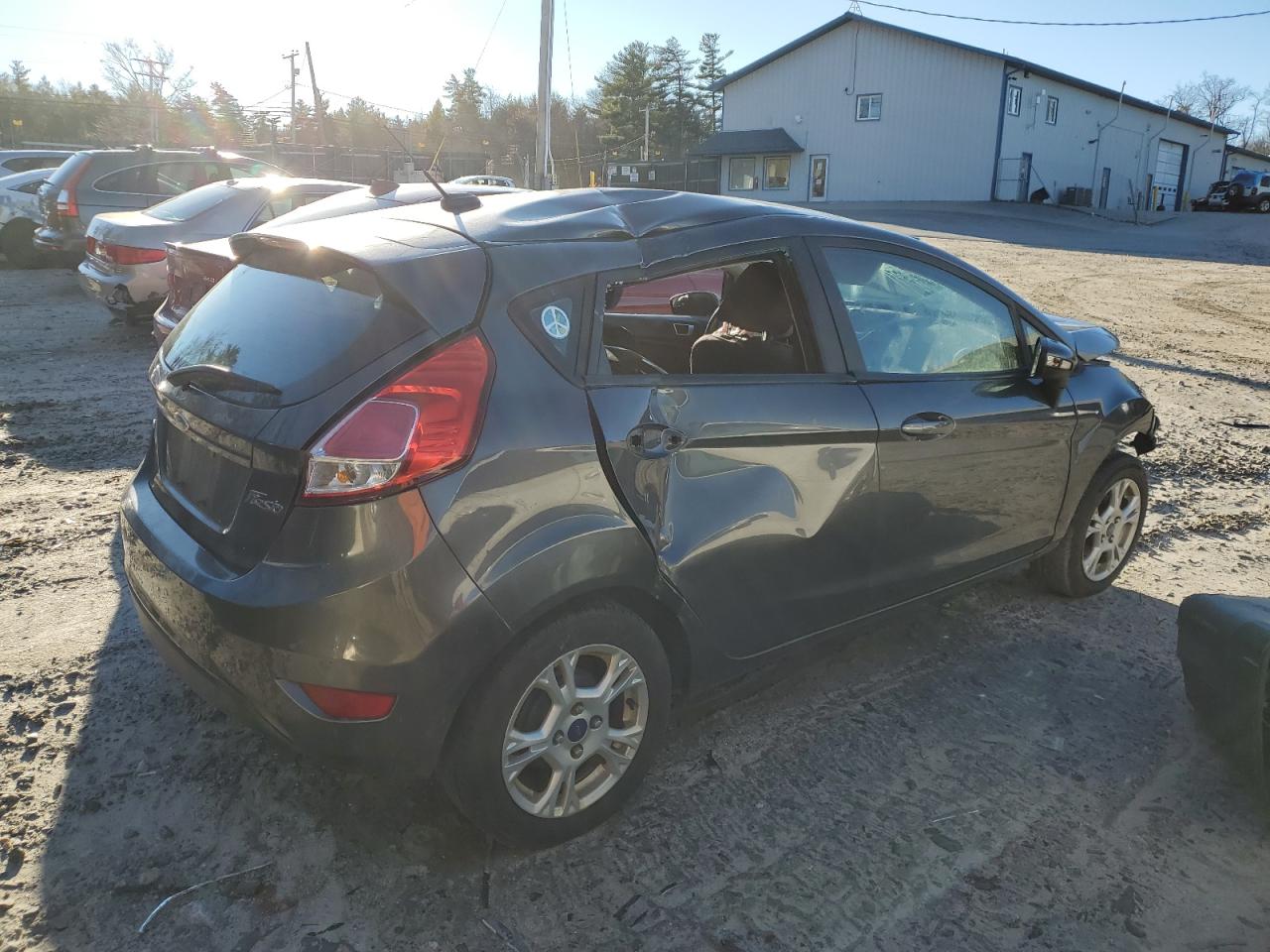 2015 Ford Fiesta VIN 3FADP4EJXFM208386 Copart auction photo, front end / side damage thumbnail 3