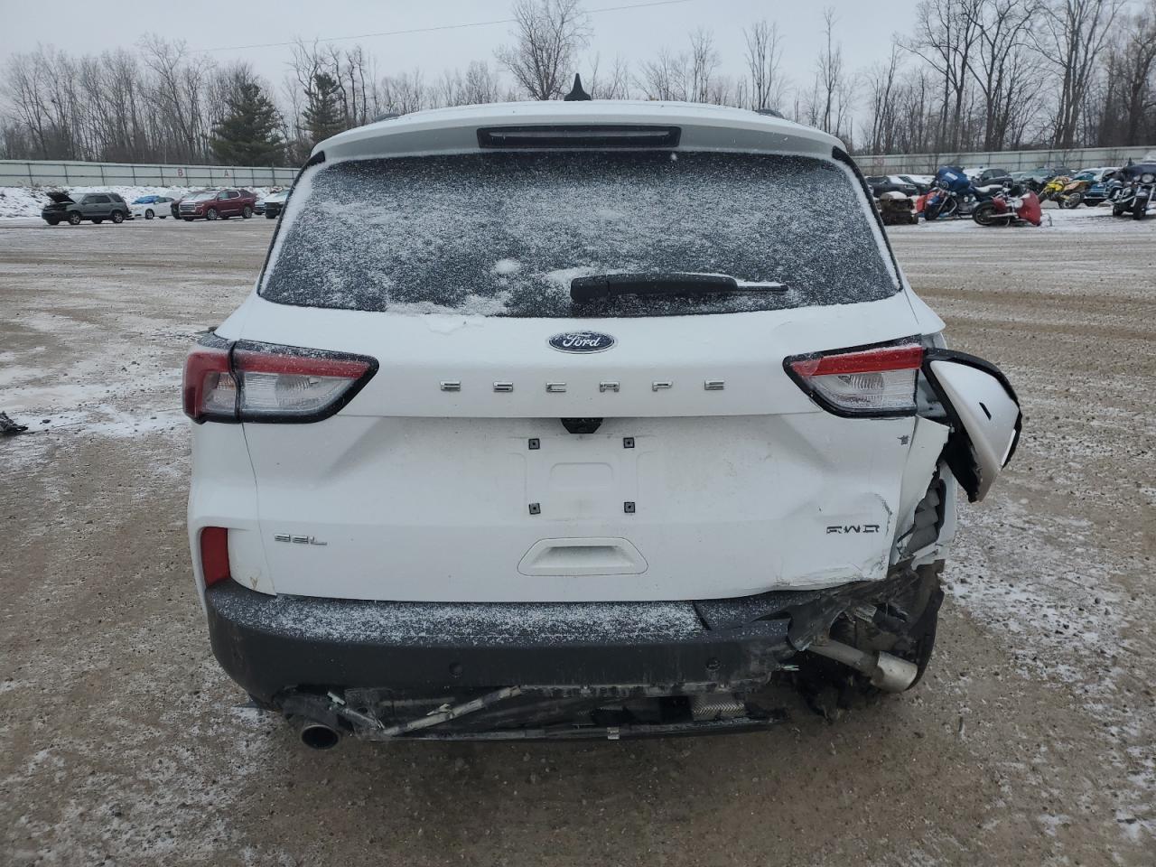2021 Ford Escape VIN 1FMCU9H65MUB22099 Copart auction photo, all over damage thumbnail 6