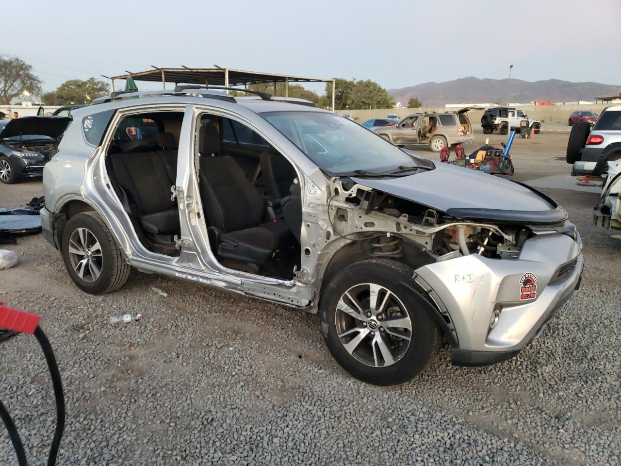 2018 Toyota RAV 4 VIN JTMWFREV4JJ178555 Copart auction photo, all over damage thumbnail 4