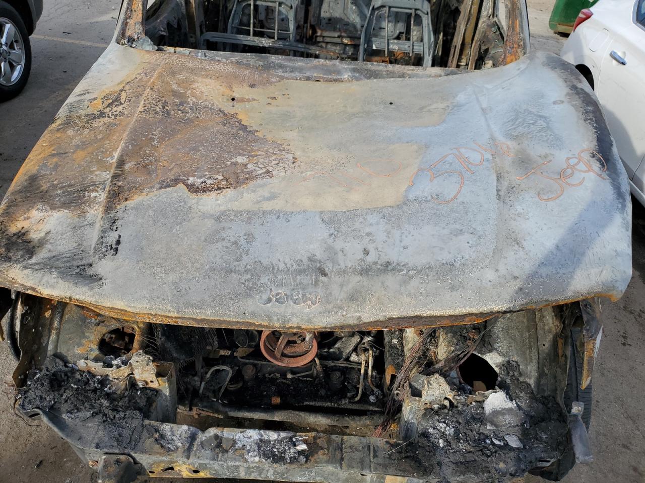 2012 Jeep Liberty (North America) VIN 1C4PJMFK0CW125237 Copart auction photo, burn / missing/altered vin damage thumbnail 12