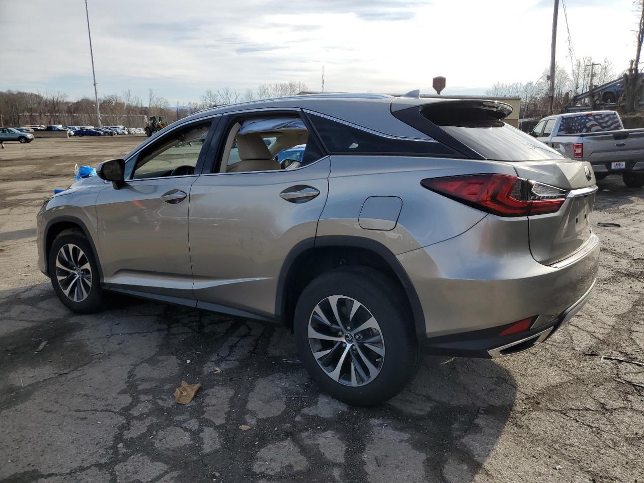 2021 Lexus RX VIN 2T2HZMDA2MC304263 Copart auction photo, front end / minor dent/scratches damage thumbnail 2