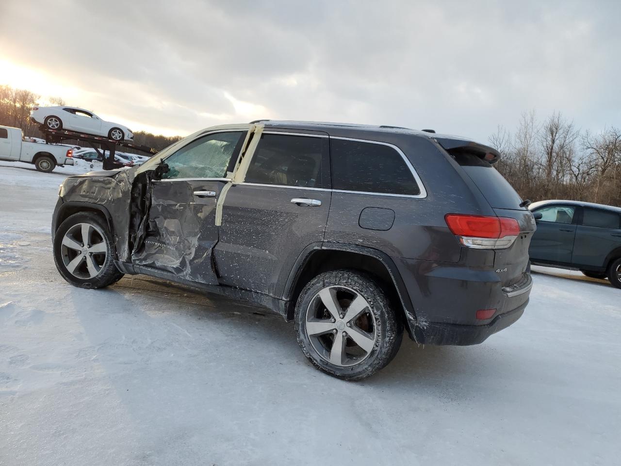 2015 Jeep Grand Cherokee VIN 1C4RJFBG9FC605627 Copart auction photo, side / front end damage thumbnail 2
