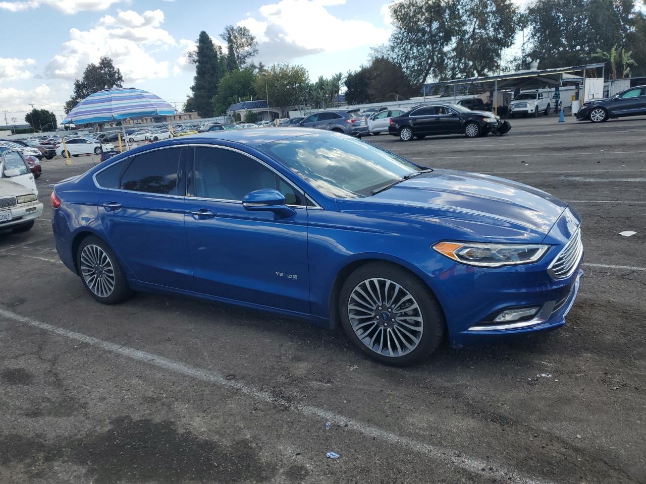 2018 Ford Fusion VIN 3FA6P0RUXJR214111 Copart auction photo, side / minor dent/scratches damage thumbnail 4