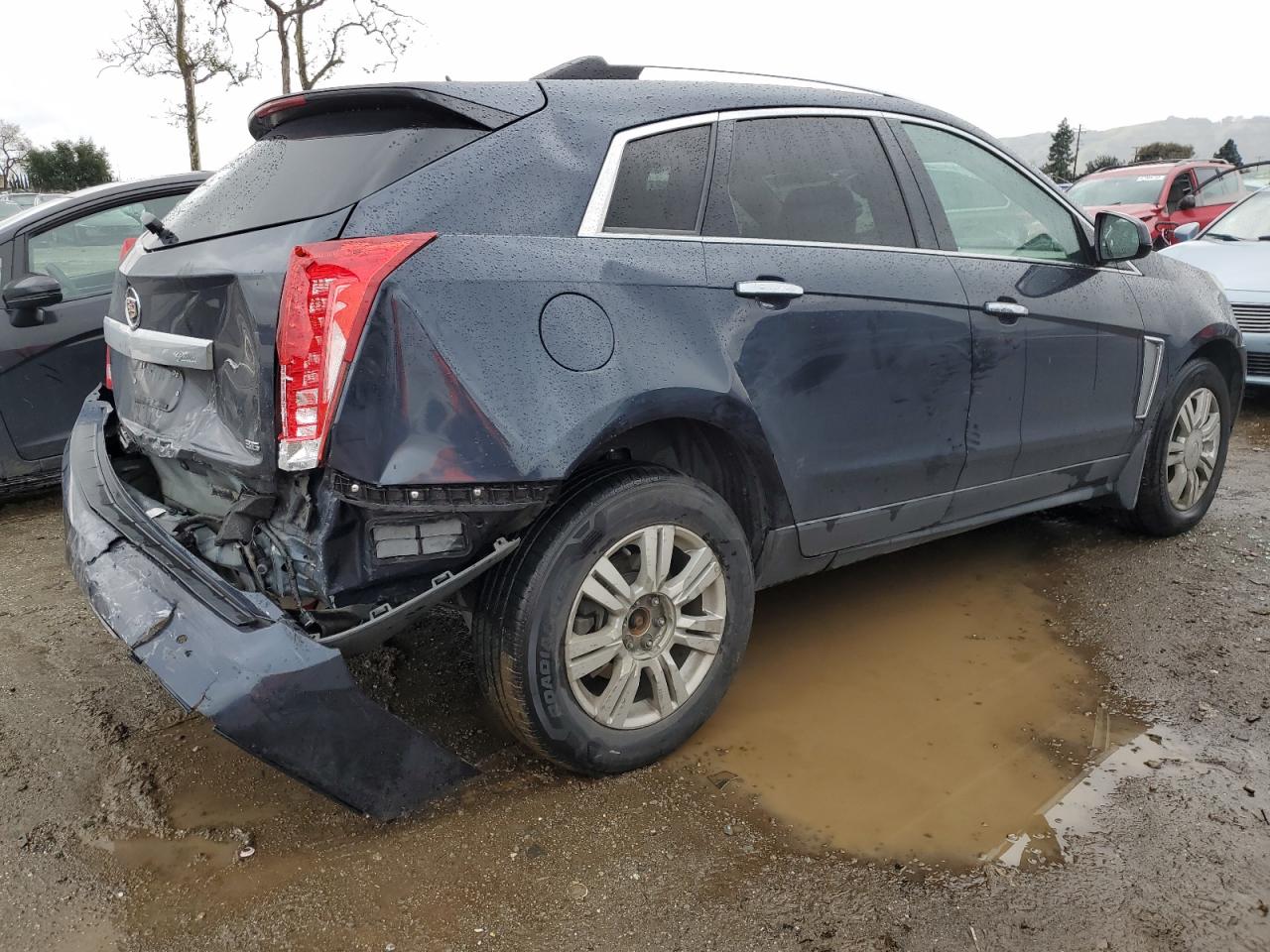 2016 Cadillac SRX VIN 3GYFNEE3XGS516570 Copart auction photo, front end / side damage thumbnail 3