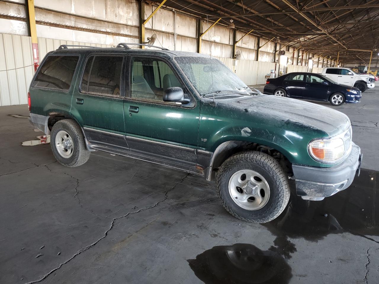 2001 Ford Explorer VIN 1FMZU83P71ZA33864 Copart auction photo, burn damage thumbnail 4