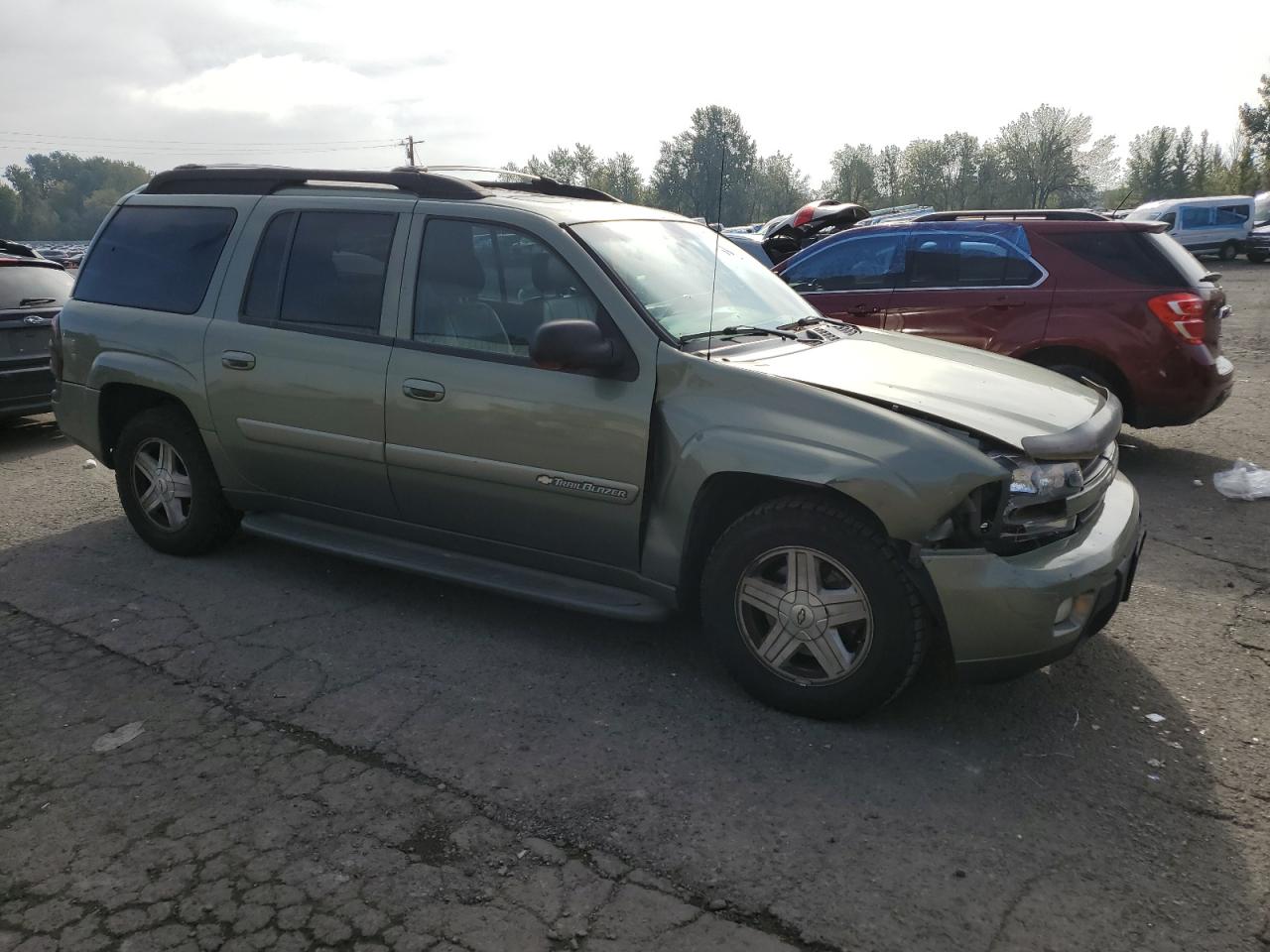 2003 Chevrolet TrailBlazer VIN 1GNET16S532166896 Copart auction photo, front end / side damage thumbnail 4