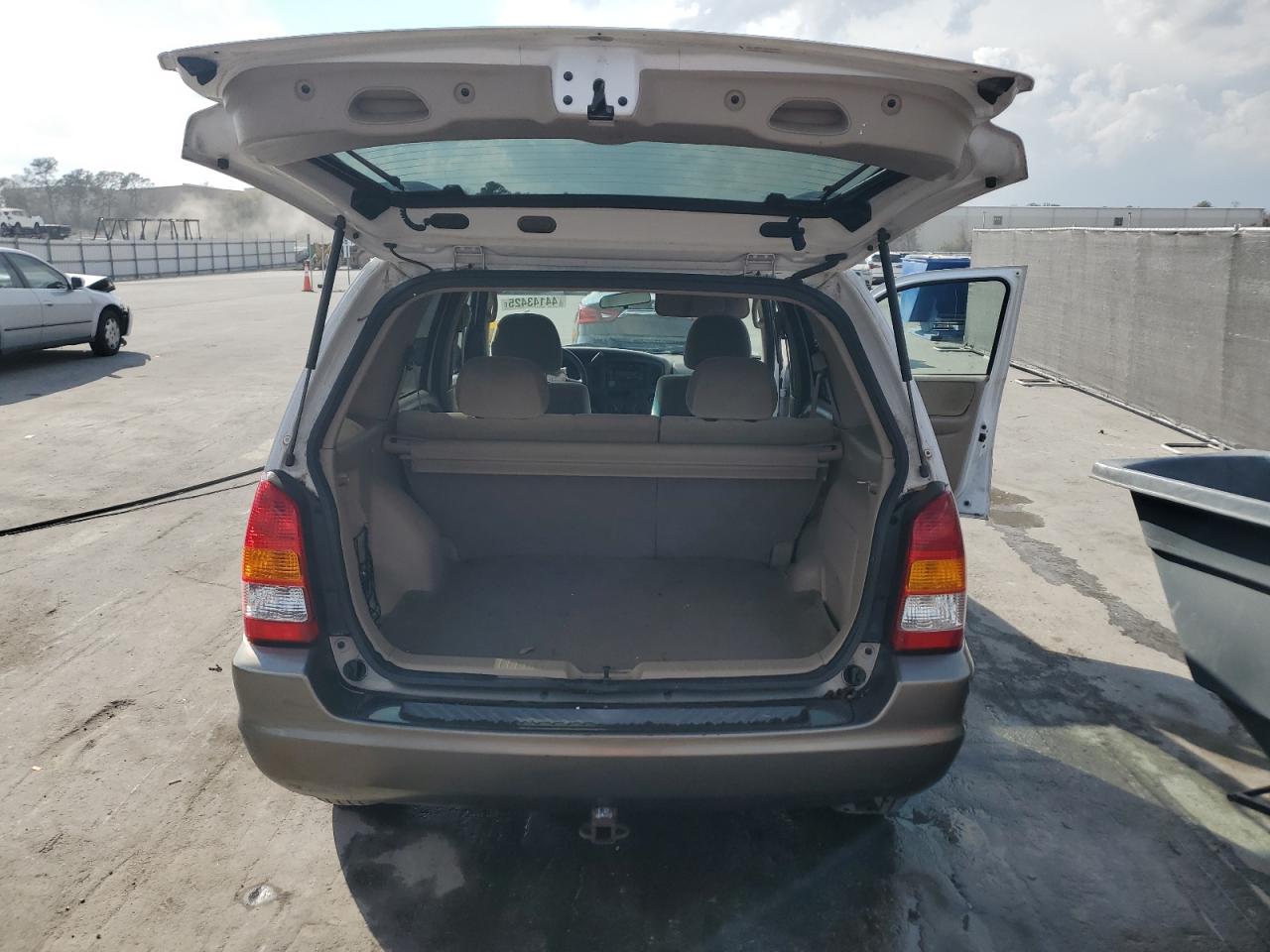 2002 Mazda Tribute VIN 4F2YU09192KM34458 Copart auction photo, front end / side damage thumbnail 6