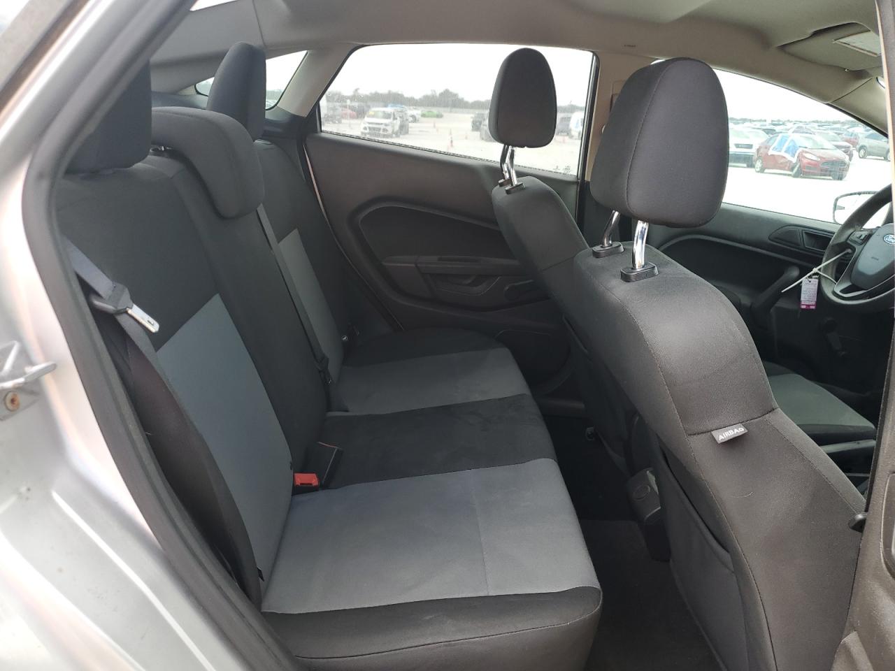 2016 Ford Fiesta VIN 3FADP4AJ1GM206288 Copart auction photo, rear end damage thumbnail 10