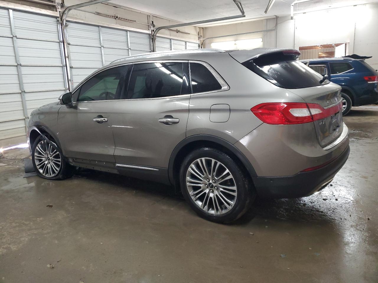 2017 Lincoln MKX VIN 2LMPJ6LR2HBL45677 Copart auction photo, side / mechanical damage thumbnail 2