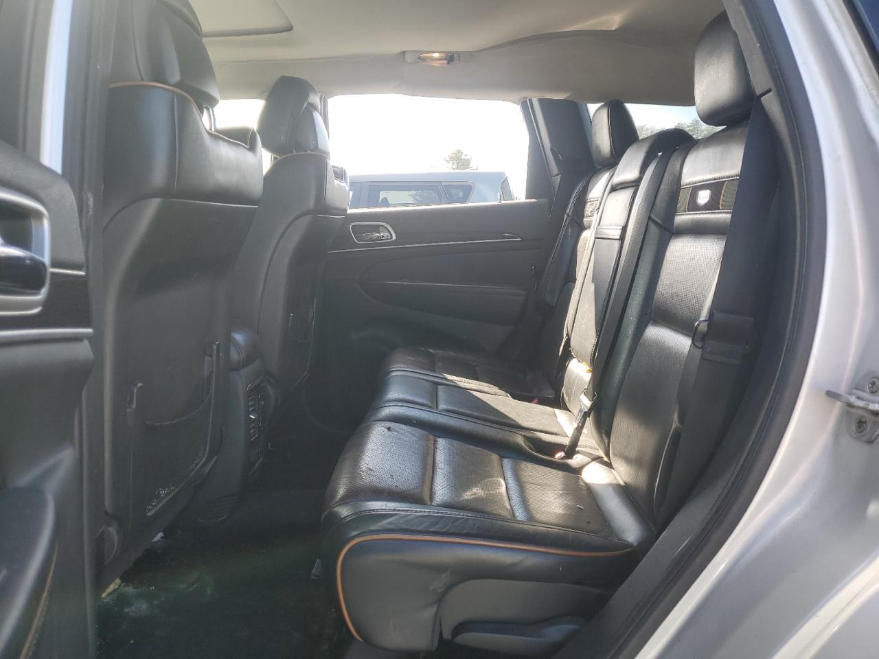 2011 Jeep Grand Cherokee VIN 1J4RR4GG7BC666484 Copart auction photo, side / rear end damage thumbnail 11