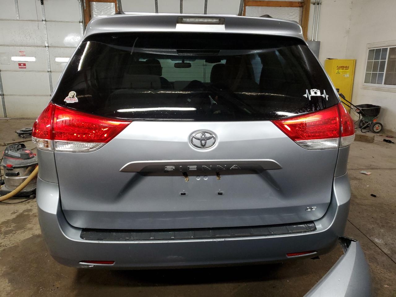 2014 Toyota Sienna VIN 5TDKK3DC0ES523127 Copart auction photo, front end / minor dent/scratches damage thumbnail 6