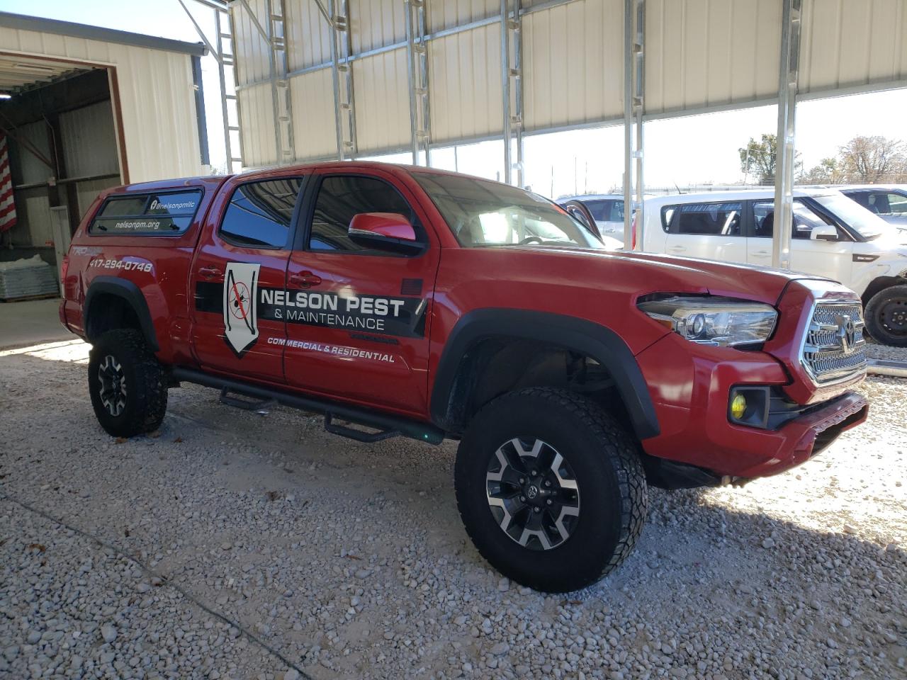 2016 Toyota Tacoma VIN 3TMDZ5BN4GM009918 Copart auction photo, front end / side damage thumbnail 4