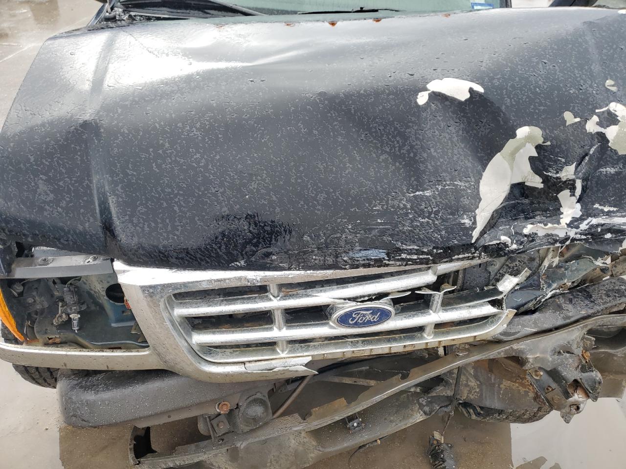 2003 Ford Ranger VIN 1FTYR10UX3PA77424 Copart auction photo, front end / hail damage thumbnail 11