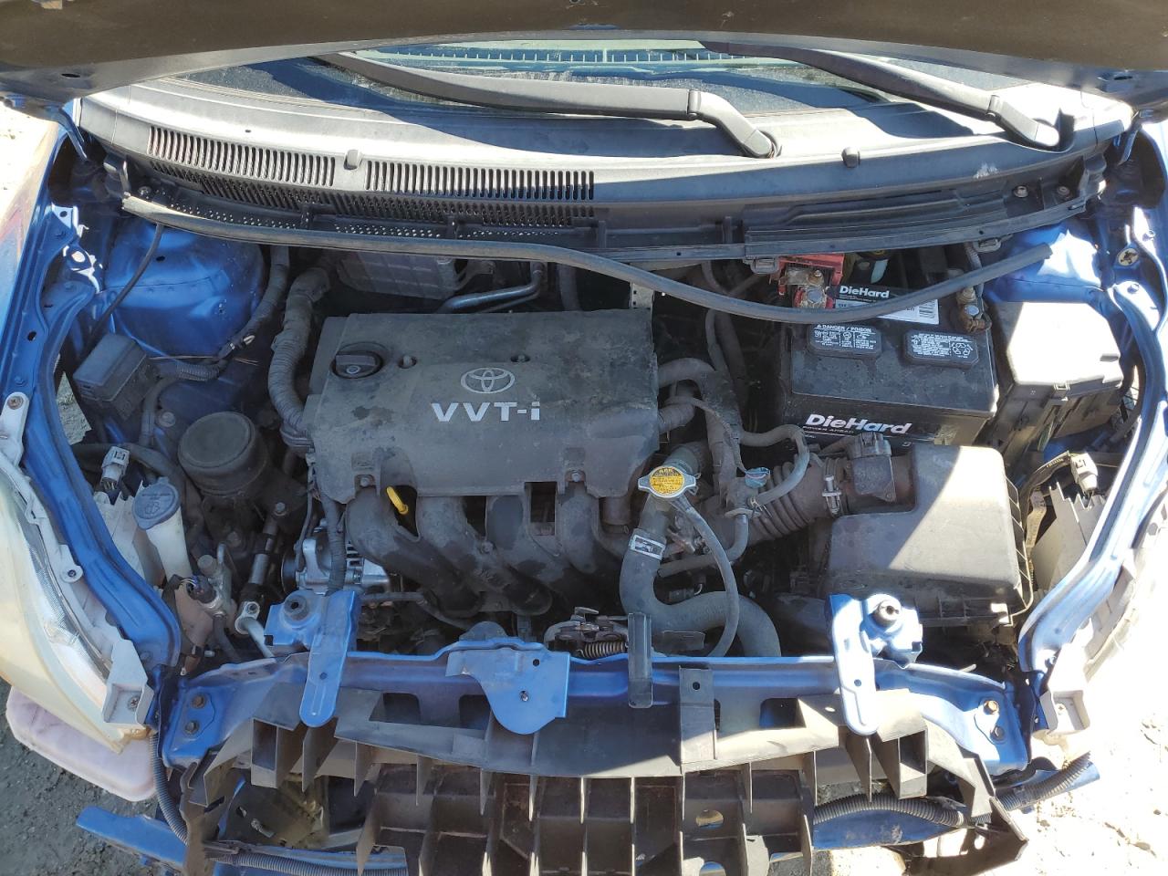 2009 Toyota Yaris VIN JTDBT903194060115 Copart auction photo, front end / rear end damage thumbnail 12