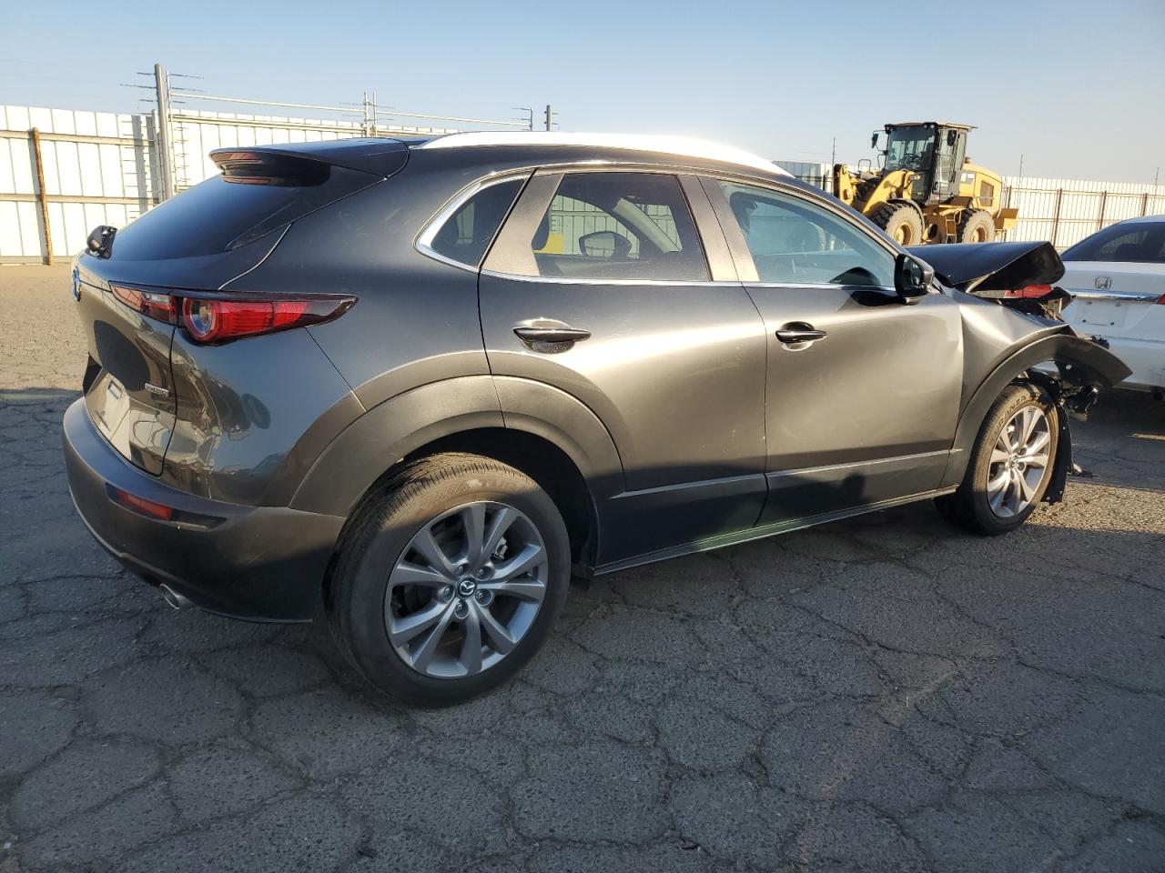 2023 Mazda CX-30 VIN 3MVDMBBM7PM585957 Copart auction photo, front end damage thumbnail 3