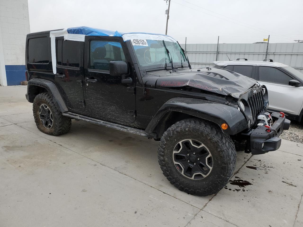2016 Jeep Wrangler VIN 1C4HJWFG5GL197439 Copart auction photo, rollover damage thumbnail 4